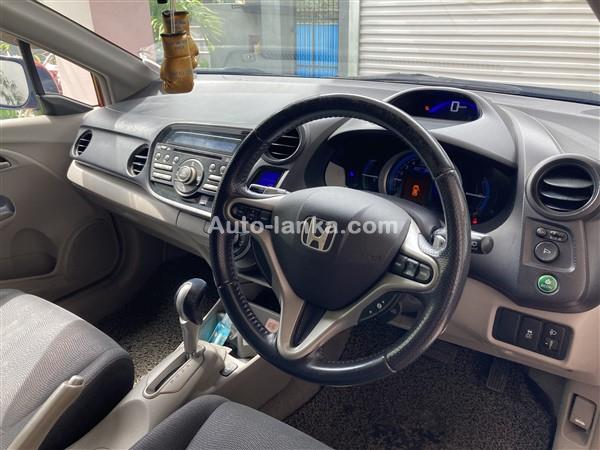 HONDA INSIGHT HYBRID CAR FOR RENT